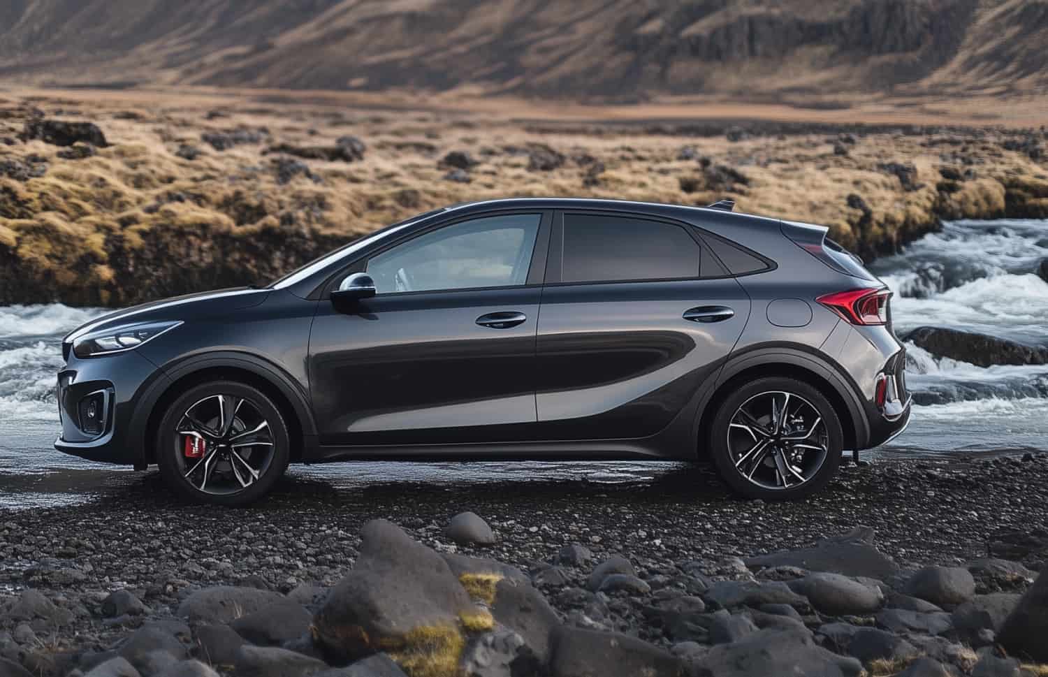 Kia Cee’d hatchback gris foncé avec boîte manuelle, GPS, caméra de recul et sièges chauffants, parfaite pour 5 passagers et 3 bagages en Islande.