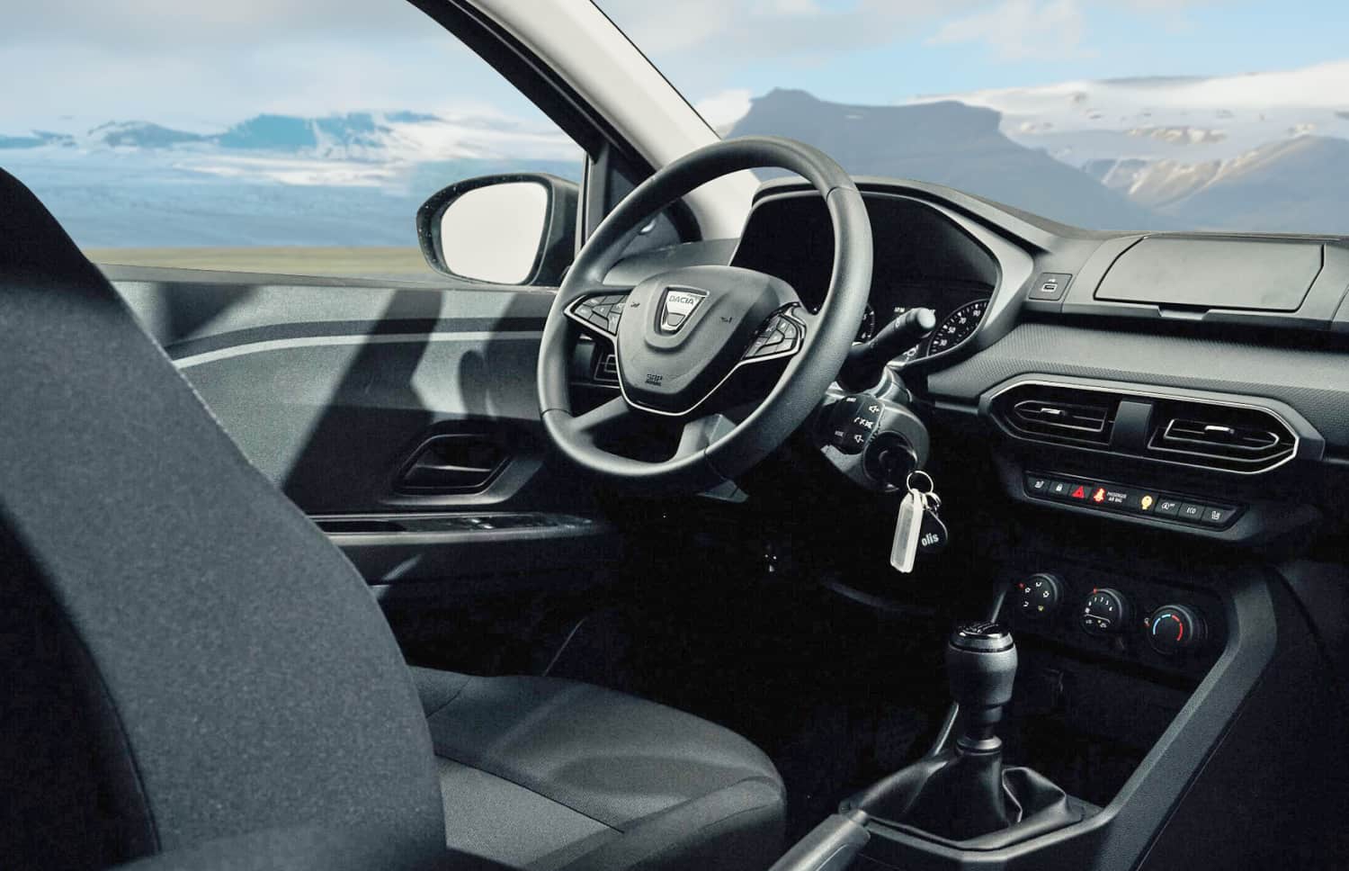 Dacia Jogger noire, boîte manuelle, 7 places avec GPS, USB et sièges chauffants, véhicule spacieux pour les voyages en groupe ou en famille en Islande.